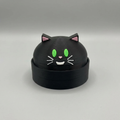 Black cat dump figure on grey background