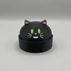 Black cat dump figure on grey background