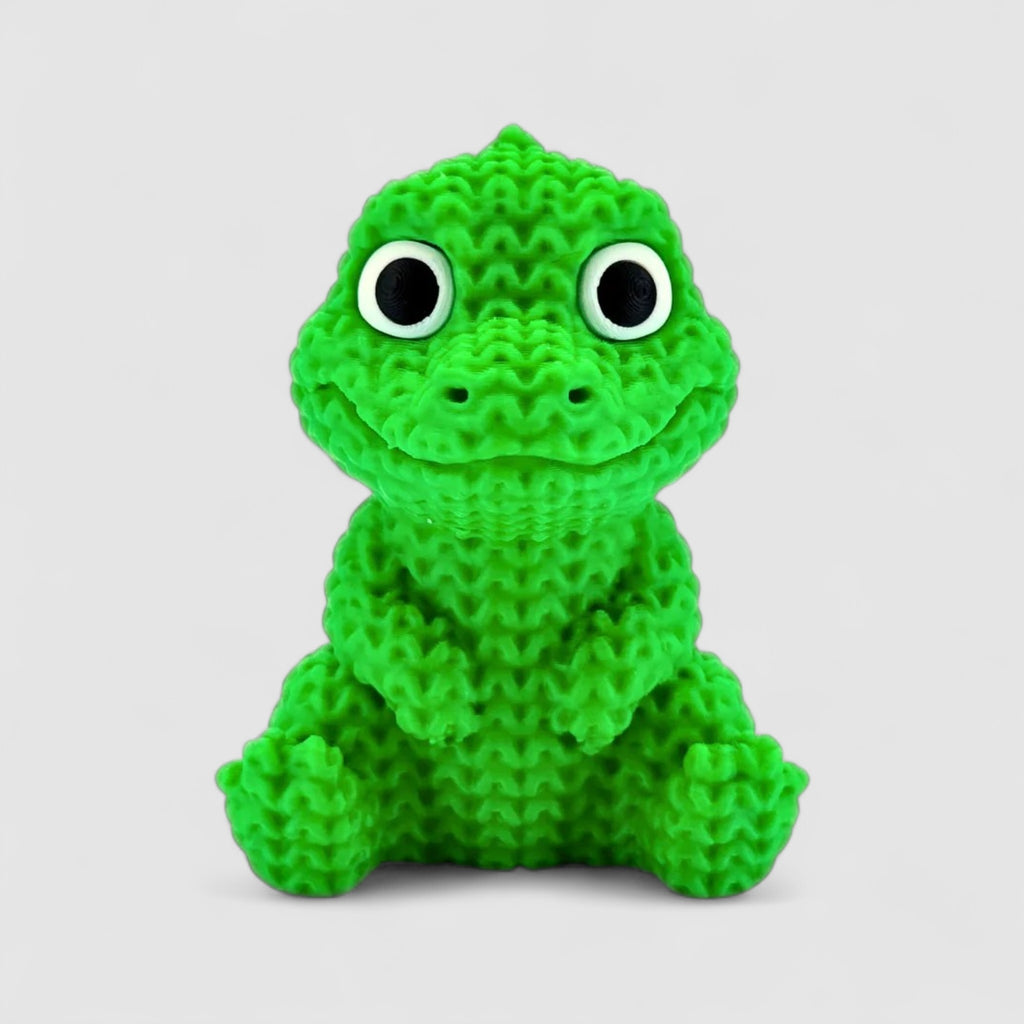 Chompy the Knitted Crocodile, 3D printed figure on grey background | sgc-photo-v1