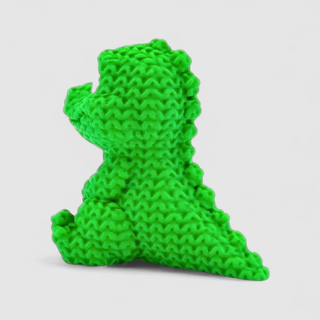 Chompy the Knitted Crocodile, 3D printed figure on grey background | sgc-photo-v1