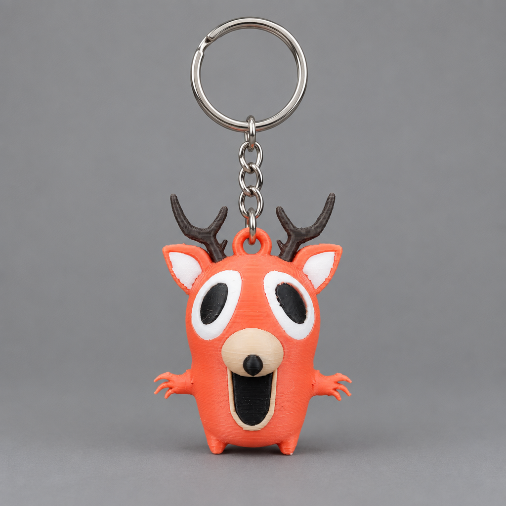 Deer keychain on gray background | sgc-photo-ok