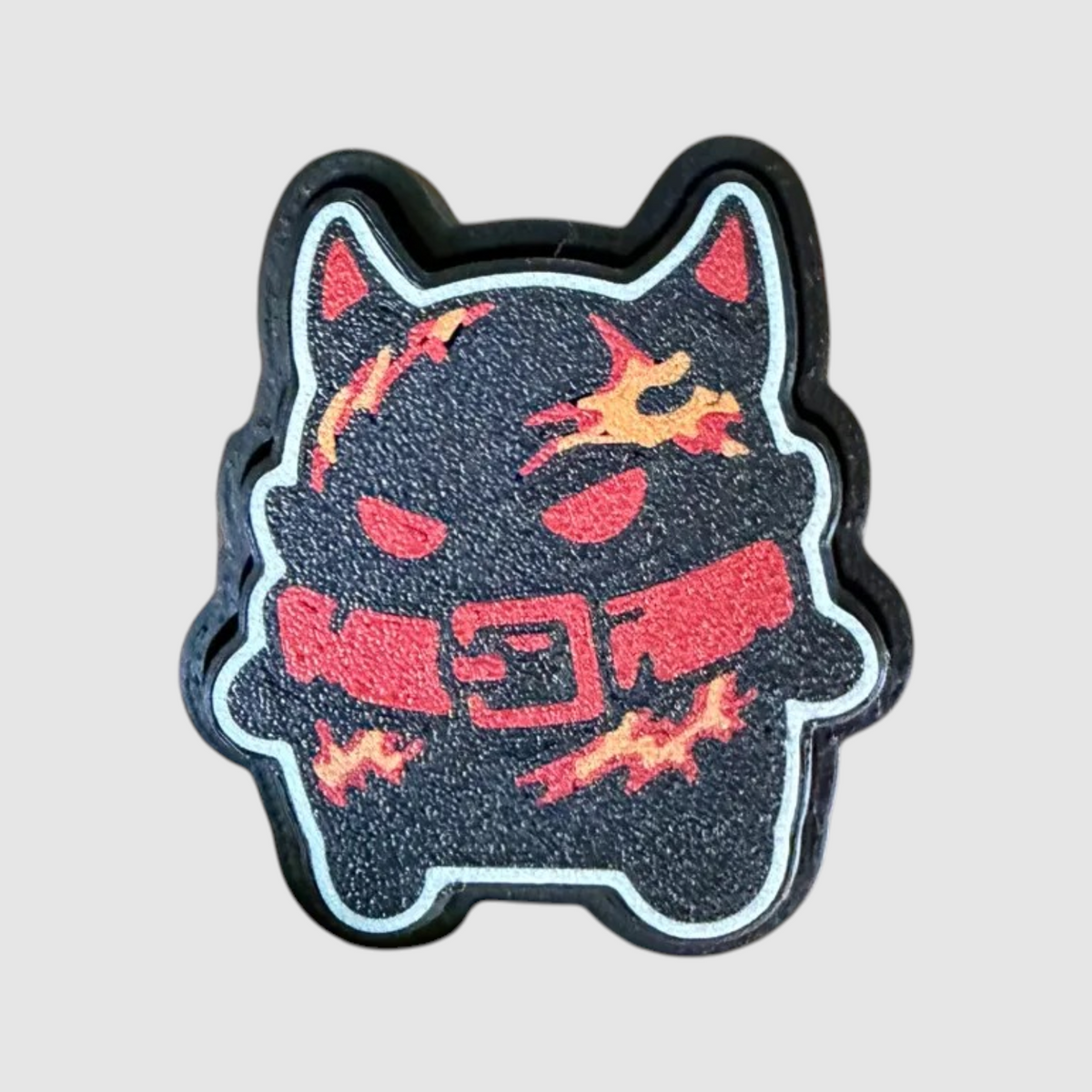 Demon 3D printed clicker on grey