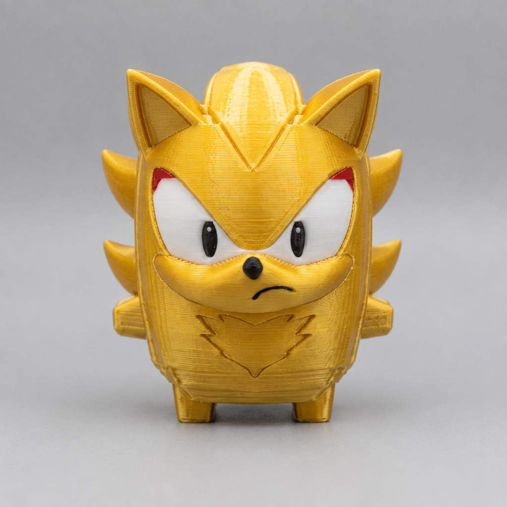 Gold Shadow figure with back fins | sgc-photo-ok