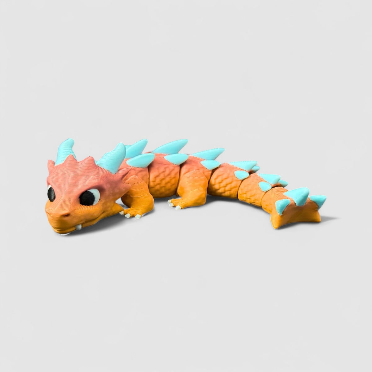 Horned Mini Dragon, 3D printed figure on grey background | sgc-photo-v1