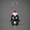 Black Punk figure keychain with white bolt and pink-tipped spikes | sgc-photo-ok