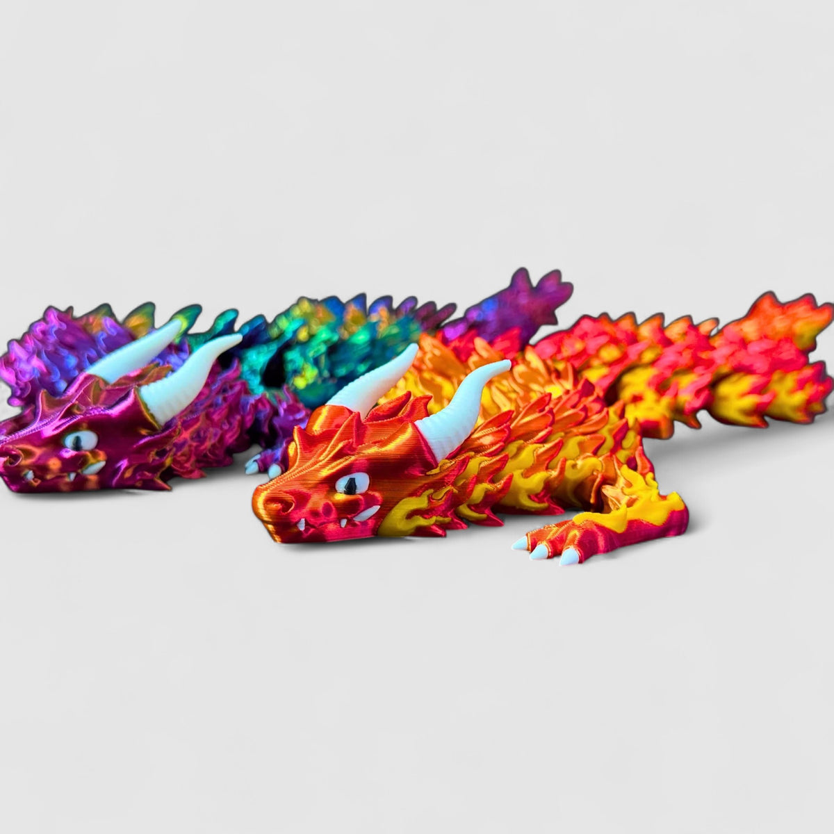 Inferno Flame Articulated Dragon, 3D printed figure on grey background | sgc-photo-v1