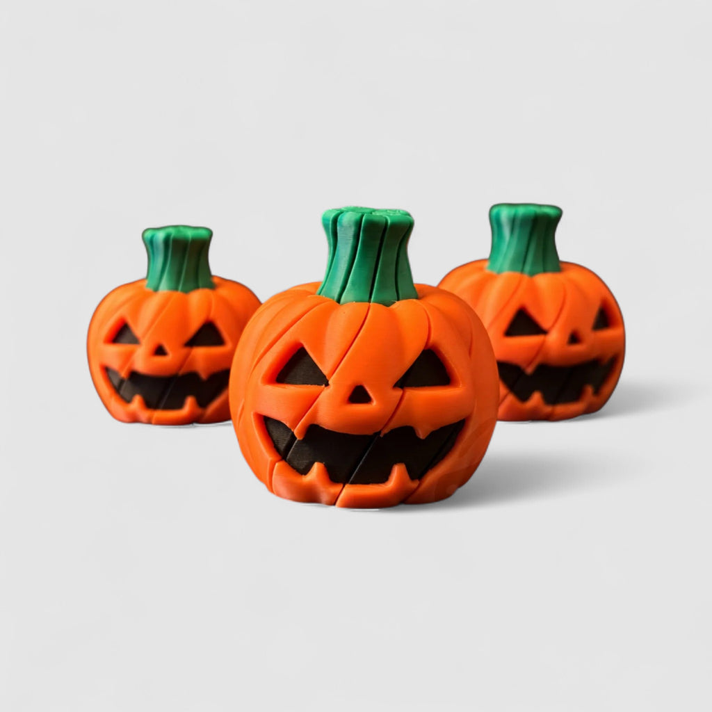 Jack-O-Twist Pumpkin Fidget, 3D printed figure on grey background | sgc-photo-v1