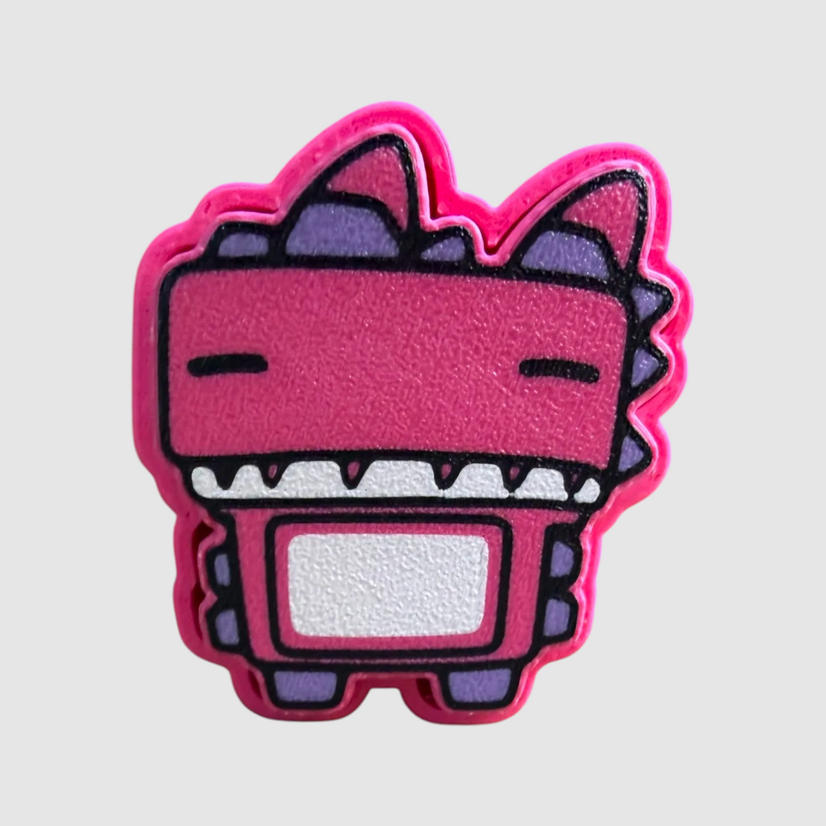 Klombo (Eyes Closed) 3D printed clicker on grey