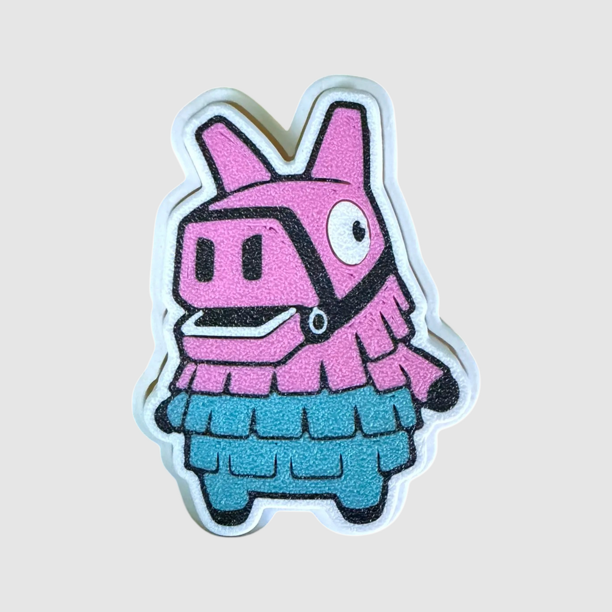 Llama 3D printed clicker on grey