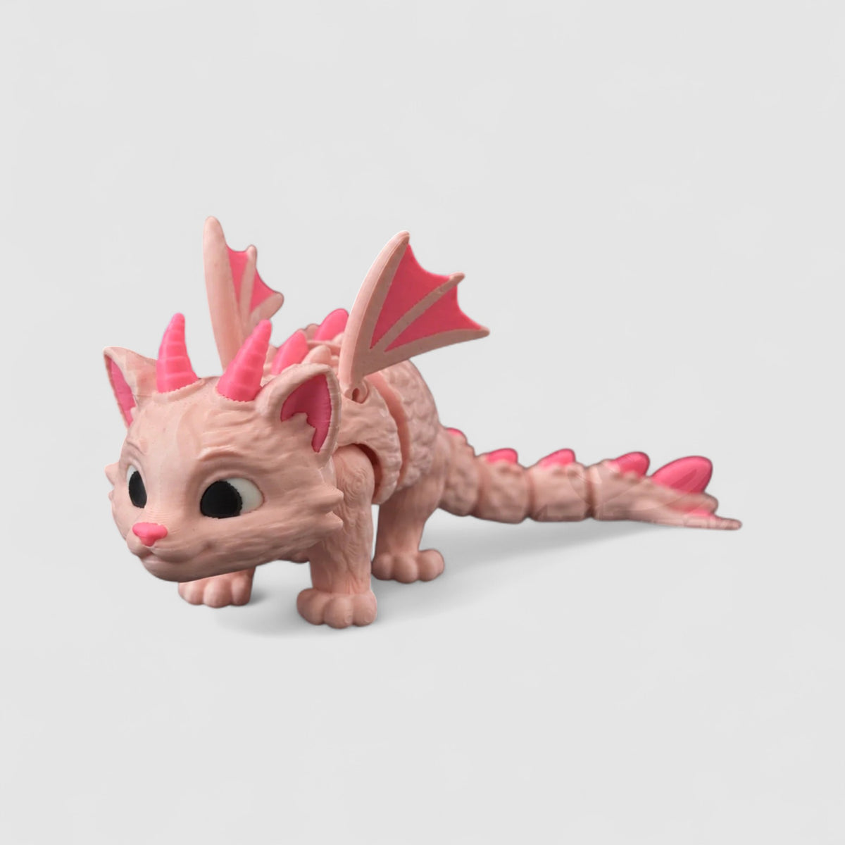 Mewryn the Cat Dragon, 3D printed figure on grey background | sgc-photo-v1