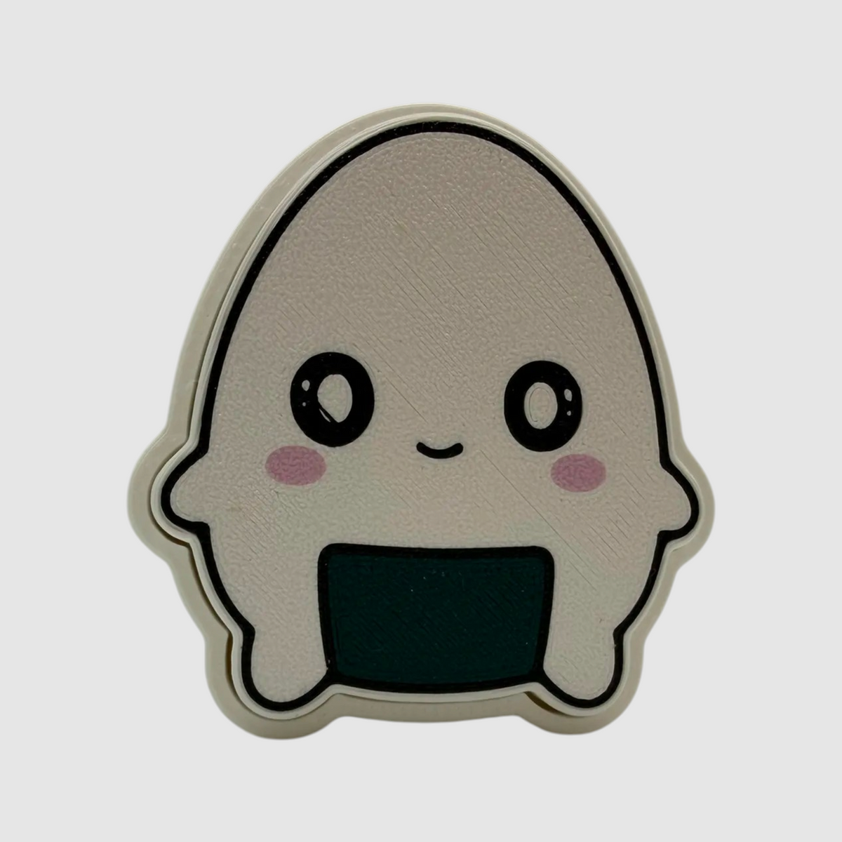Onigiri 3D printed clicker on grey