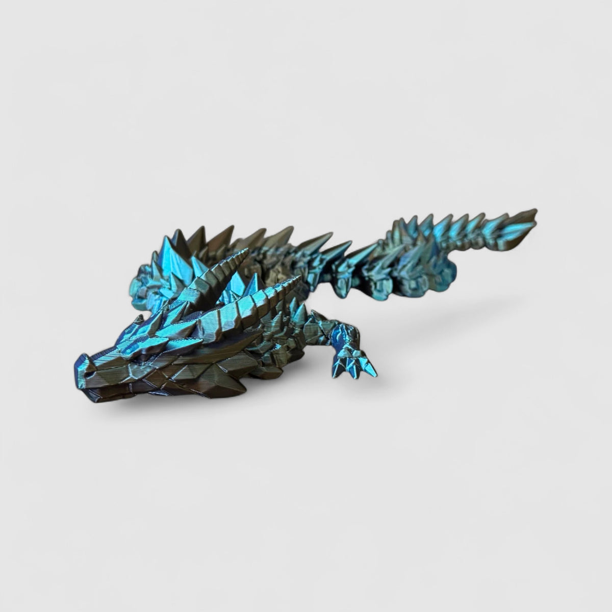 Prismor Crystal Stone Dragon, 3D printed figure on grey background | sgc-photo-v1