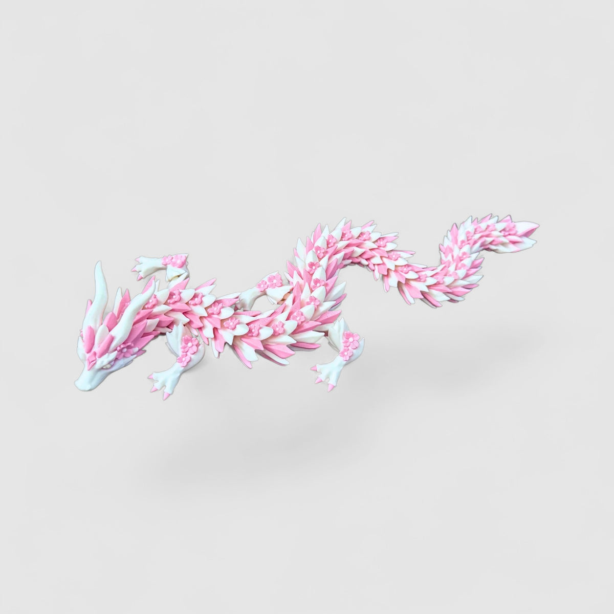 Sakuryn the Cherry Blossom Dragon, 3D printed figure on grey background | sgc-photo-v1