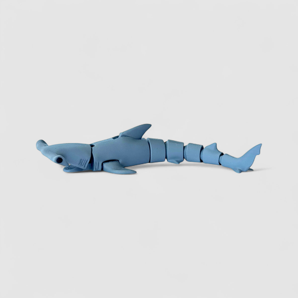 Snapjaw Hammerhead Shark Fidget, 3D printed figure on grey background | sgc-photo-v1