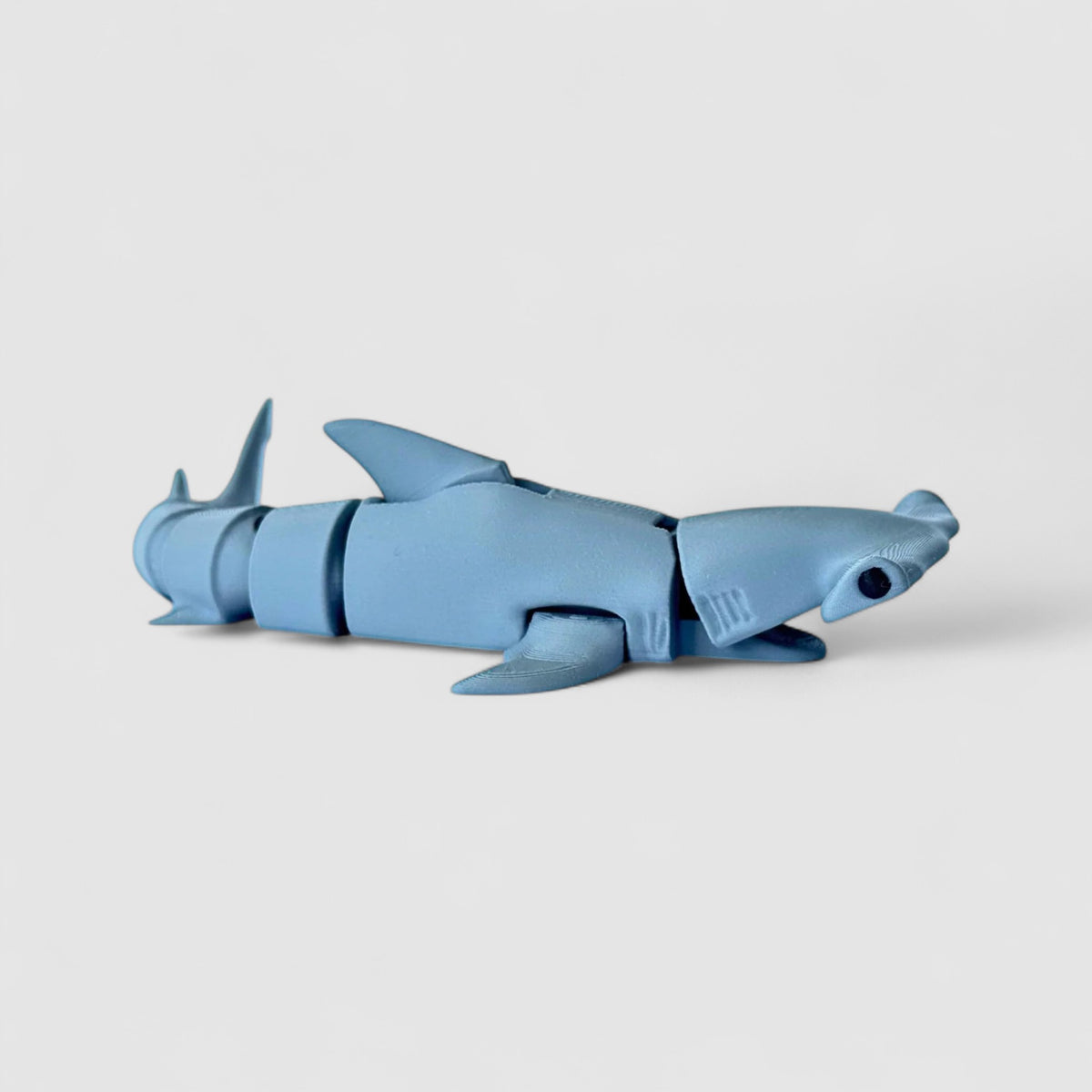 Snapjaw Hammerhead Shark Fidget, 3D printed figure on grey background | sgc-photo-v1