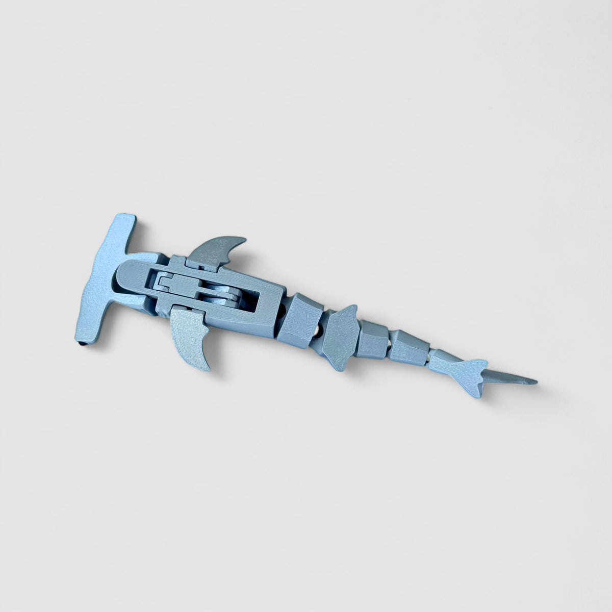 Snapjaw Hammerhead Shark Fidget, 3D printed figure on grey background | sgc-photo-v1